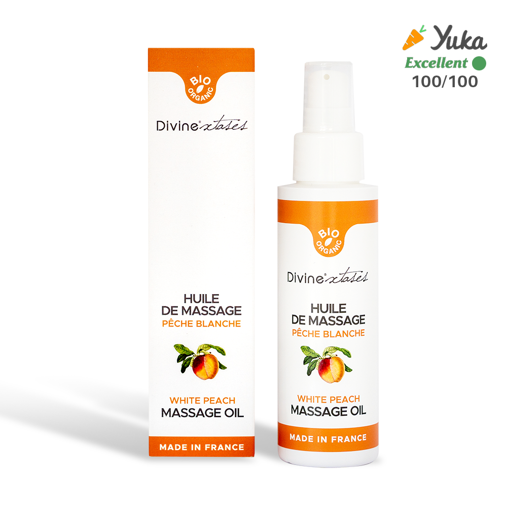Huile de Massage Divinextases aux gout Peche blanche sur un fond blanc